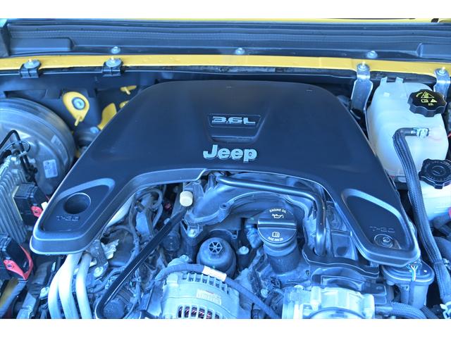 ジープ・ラングラーアンリミテッド ルビコン スカイワンタッチパワートップ 49台限定車/ヘラヤライエロー/純正電動ソフトトップ/ボンネットシールド/専用19インチAW/専用ロゴステッカー/専用デフロック機構/シートヒーター/ステアリングヒーター/BFグドリッヂMTタイヤ(64枚目)