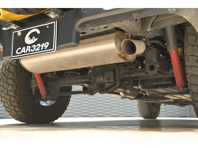 ジープ・ラングラーアンリミテッド ルビコン スカイワンタッチパワートップ 49台限定車/ヘラヤライエロー/純正電動ソフトトップ/ボンネットシールド/専用19インチAW/専用ロゴステッカー/専用デフロック機構/シートヒーター/ステアリングヒーター/BFグドリッヂMTタイヤ(65枚目)
