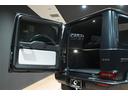 Ｇ６３　法人１オーナー／ナイトブラックマグノ／ＭＡＮＵＦＡＫＴＵＲプログラムプラス／白黒レザー／ＡＭＧナイトパッケージ／ＭＡＮＵＦＡＫＴＵＲインテリアプラス／ＡＭＧ２２インチ／Ｂｕｒｍｅｓｔｅｒ３Ｄサラウンド（56枚目）