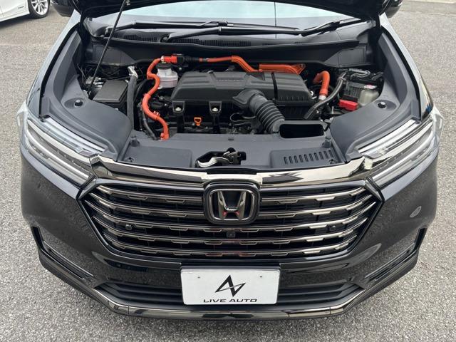 オデッセイハイブリッド 大型ナビ TV 全周囲カメラ 後席大型モニター 黒革 パワーシート シートヒーター 2ndシートオットマン 電動リアゲート LEDヘッドライト 両側パワースライド 専用塗装18インチアルミ ETC(58枚目)