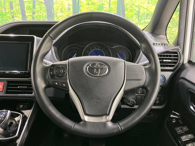 ヴォクシー ハイブリッドＺＳ　煌　禁煙車　純正９型ナビ　バックカメラ　両側電動ドア　衝突軽減　オートマチックハイビーム　クルーズコントロール　車線逸脱警報　シートヒーター　ＥＴＣ　Ｂｌｕｅｔｏｏｔｈ　フルセグ　ＬＥＤヘッド（13枚目）