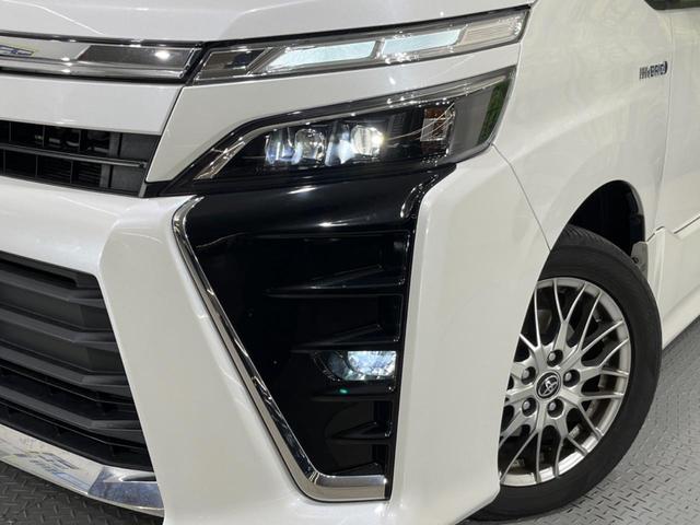 ヴォクシー ハイブリッドＺＳ　煌　禁煙車　純正９型ナビ　バックカメラ　両側電動ドア　衝突軽減　オートマチックハイビーム　クルーズコントロール　車線逸脱警報　シートヒーター　ＥＴＣ　Ｂｌｕｅｔｏｏｔｈ　フルセグ　ＬＥＤヘッド（14枚目）