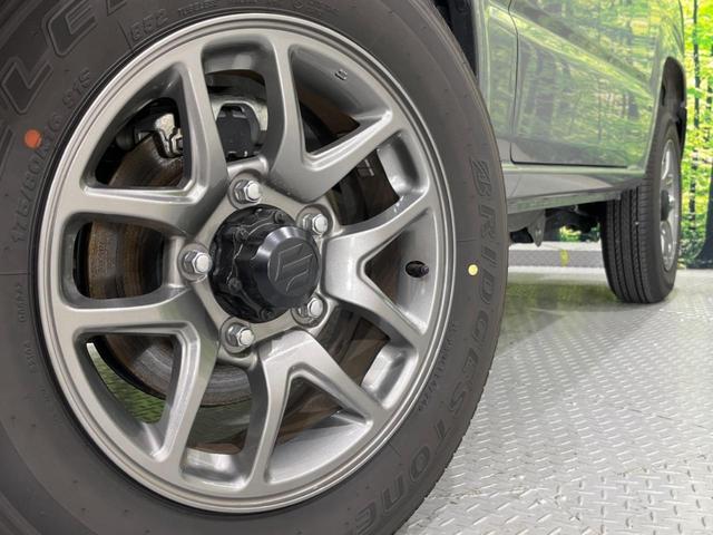 ジムニー ＸＣ　４ＷＤ　衝突被害軽減システム　禁煙車　スマートキー　ＬＥＤヘッド　クルコン　車線逸脱警報　オートライト　オートエアコン　純正１６インチアルミ（13枚目）