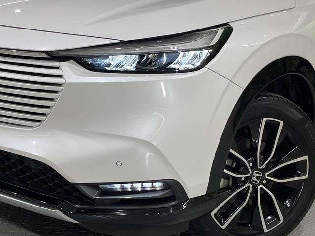 ヴェゼル ｅ：ＨＥＶ　Ｚ　禁煙車　純正９型ナビ　バックカメラ　ホンダセンシング　レーダークルーズ　オートマチックハイビーム　車線逸脱警報　シートヒーター　ＥＴＣ　Ｂｌｕｅｔｏｏｔｈ　フルセグ　ＬＥＤヘッド／フォグ（12枚目）