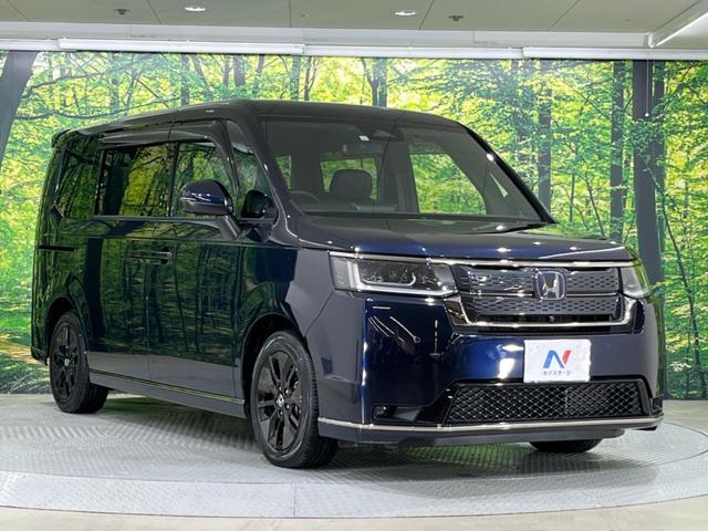 ステップワゴン ｅ：ＨＥＶスパーダ　禁煙車　純正１１型ナビ　全周囲カメラ　両側電動スライド　ホンダセンシング　レーダークルーズ　オートマチックハイビーム　ブラインドスポットモニター　ＥＴＣ　Ｂｌｕｅｔｏｏｔｈ　フルセグシートヒーター（17枚目）
