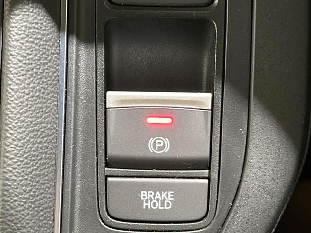 ステップワゴン ｅ：ＨＥＶスパーダ　禁煙車　純正１１型ナビ　全周囲カメラ　両側電動スライド　ホンダセンシング　レーダークルーズ　オートマチックハイビーム　ブラインドスポットモニター　ＥＴＣ　Ｂｌｕｅｔｏｏｔｈ　フルセグシートヒーター（24枚目）