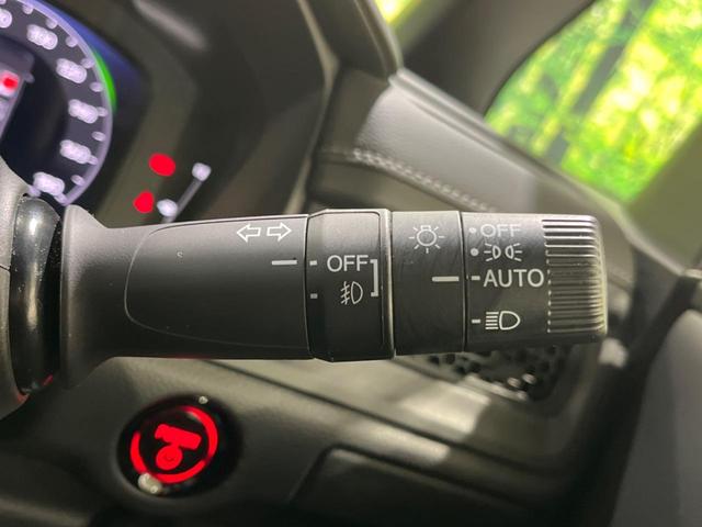 ステップワゴン ｅ：ＨＥＶスパーダ　禁煙車　純正１１型ナビ　全周囲カメラ　両側電動スライド　ホンダセンシング　レーダークルーズ　オートマチックハイビーム　ブラインドスポットモニター　ＥＴＣ　Ｂｌｕｅｔｏｏｔｈ　フルセグシートヒーター（26枚目）