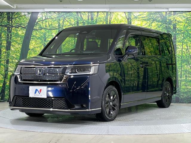 ステップワゴン ｅ：ＨＥＶスパーダ　禁煙車　純正１１型ナビ　全周囲カメラ　両側電動スライド　ホンダセンシング　レーダークルーズ　オートマチックハイビーム　ブラインドスポットモニター　ＥＴＣ　Ｂｌｕｅｔｏｏｔｈ　フルセグシートヒーター（51枚目）