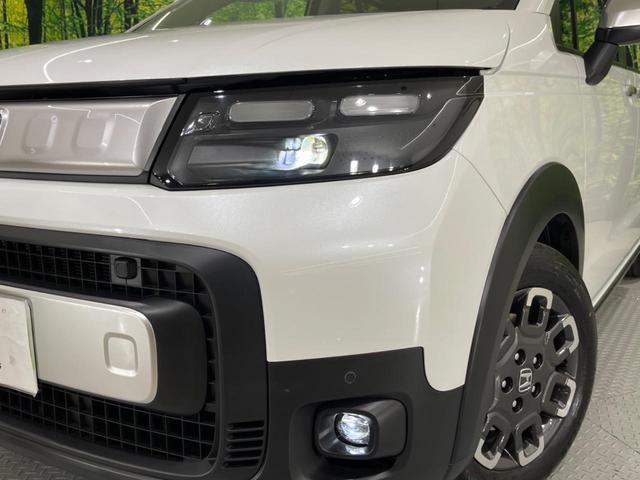 フリード e:HEVクロスター 登録済未使用車 アダプティブクルーズコントロール 衝突軽減装置 レーンキープ ブラインドスポットモニター クリアランスソナー 両側電動スライドドア 前席シートヒーター アイドリングストップ(10枚目)