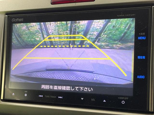 フリードハイブリッド ジャストセレクション　禁煙車　純正８型ナビ　バックカメラ　両側電動スライドドア　クルコン　ＨＩＤヘッド　オートライト　オートエアコン　Ｂｌｕｅｔｏｏｔｈ再生　フルセグ　ＥＴＣ　スマートキー（4枚目）