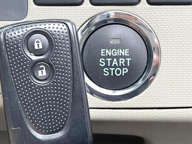 ムーヴ Ｘ　スマートキー　オートエアコン　純正１４インチアルミ　ＣＤ（4枚目）