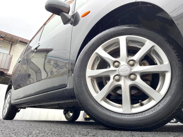 ムーヴ Ｘ　スマートキー　オートエアコン　純正１４インチアルミ　ＣＤ（10枚目）