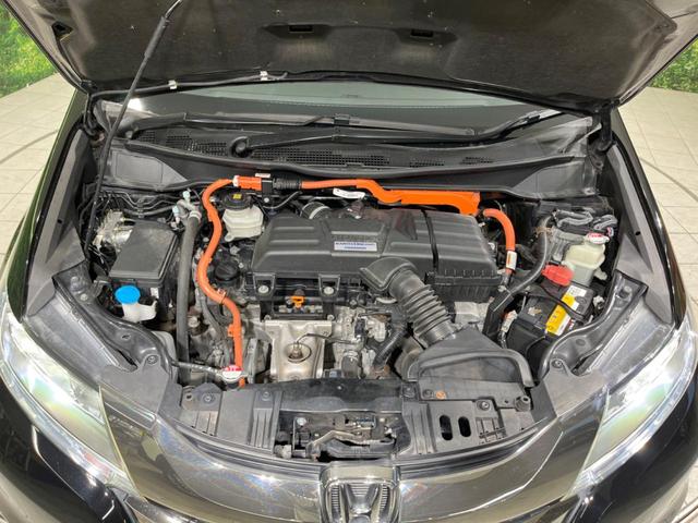 オデッセイハイブリッド ハイブリッドアブソルート・ホンダセンシンアドバンスＰ　両側電動ドア　後席モニター　全周囲カメラ　衝突被害軽減システム　レーダークルーズ　禁煙車　パワーシート　ドラレコ　コーナーセンサー　スマートキー　ＬＥＤヘッド　ビルトインＥＴＣ　車線逸脱警報（17枚目）