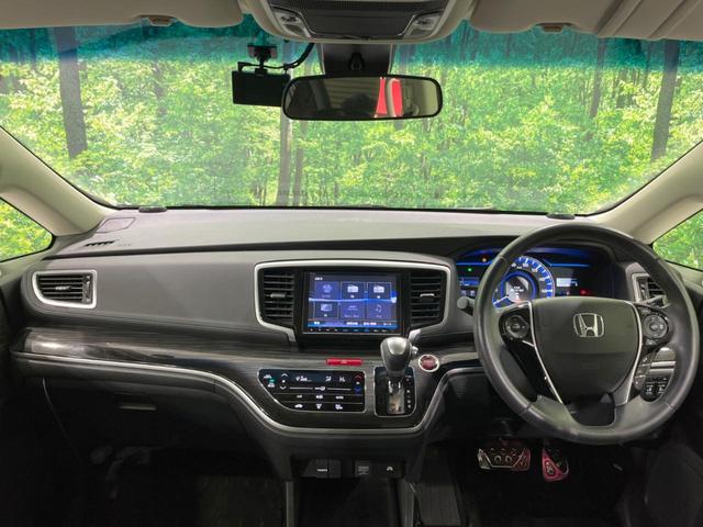 オデッセイハイブリッド ハイブリッドアブソルート・ホンダセンシング 禁煙車 純正9型ナビ フリップダウンモニター 両側電動ドア 衝突軽減装置 レーダークルーズ リアオートエアコン シートヒーター パワーシート 車線逸脱警報 ドラレコ スマートキー ETC(2枚目)