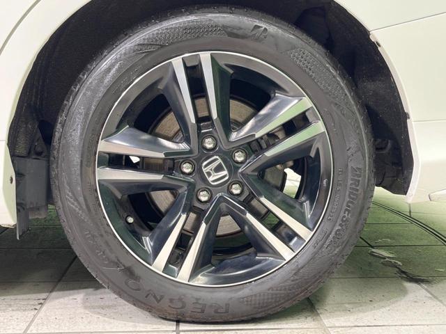 オデッセイハイブリッド ハイブリッドアブソルート・ホンダセンシング 禁煙車 純正9型ナビ フリップダウンモニター 両側電動ドア 衝突軽減装置 レーダークルーズ リアオートエアコン シートヒーター パワーシート 車線逸脱警報 ドラレコ スマートキー ETC(25枚目)