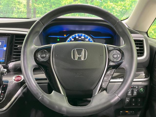 オデッセイハイブリッド ハイブリッドアブソルート・ホンダセンシング 禁煙車 純正9型ナビ フリップダウンモニター 両側電動ドア 衝突軽減装置 レーダークルーズ リアオートエアコン シートヒーター パワーシート 車線逸脱警報 ドラレコ スマートキー ETC(59枚目)