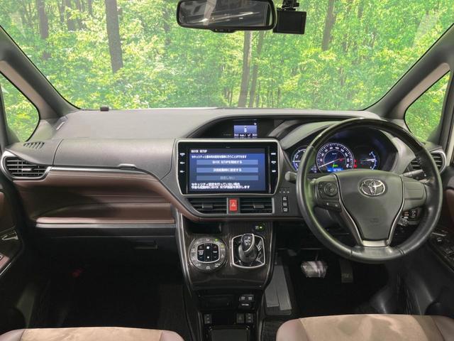 エスクァイア ハイブリッドGi プレミアムパッケージ 禁煙車 純正10型ナビ フリップダウンモニター 両側電動ドア 衝突軽減装置 シートヒーター クルコン リアオートエアコン 車線逸脱警報 バックカメラ スマートキー ETC2.0(2枚目)