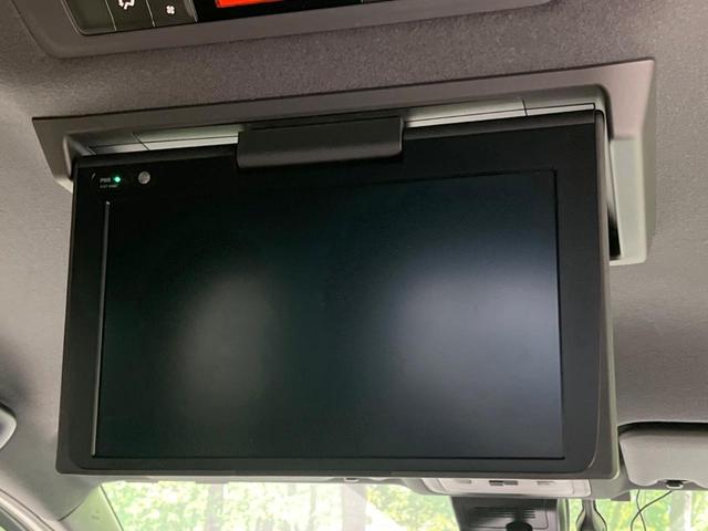 エスクァイア ハイブリッドGi プレミアムパッケージ 禁煙車 純正10型ナビ フリップダウンモニター 両側電動ドア 衝突軽減装置 シートヒーター クルコン リアオートエアコン 車線逸脱警報 バックカメラ スマートキー ETC2.0(4枚目)