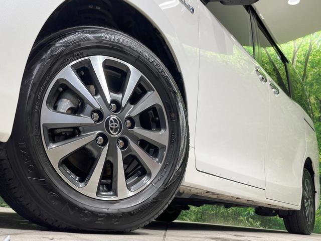 エスクァイア ハイブリッドGi プレミアムパッケージ 禁煙車 純正10型ナビ フリップダウンモニター 両側電動ドア 衝突軽減装置 シートヒーター クルコン リアオートエアコン 車線逸脱警報 バックカメラ スマートキー ETC2.0(14枚目)