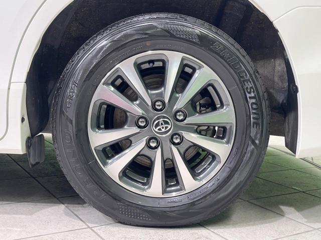 エスクァイア ハイブリッドGi プレミアムパッケージ 禁煙車 純正10型ナビ フリップダウンモニター 両側電動ドア 衝突軽減装置 シートヒーター クルコン リアオートエアコン 車線逸脱警報 バックカメラ スマートキー ETC2.0(25枚目)