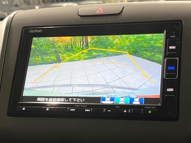 フリードハイブリッド ハイブリッド・Gブラックスタイル 禁煙車 両側電動ドア 純正ナビ バックカメラ 衝突軽減装置 レーダークルーズ コーナーセンサー スマートキー LEDヘッド ETC オートハイビーム 車線逸脱警報 ドラレコ(4枚目)