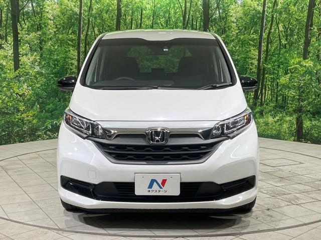 フリード+ハイブリッド ハイブリッドGブラックスタイル 両側電動スライド 純正8型ナビ バックカメラ 衝突被害軽減装置 レーダークルーズ 禁煙車 ドラレコ シートヒーター レーンアシスト LEDヘッド ETC 純正15インチアルミホイール オートライト(16枚目)