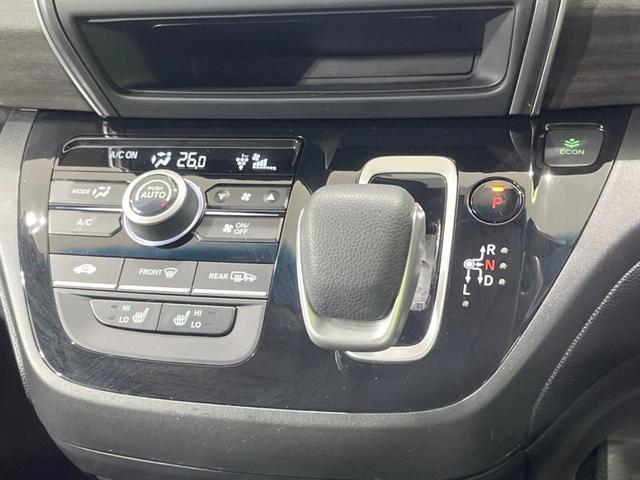 フリード+ハイブリッド ハイブリッドGブラックスタイル 両側電動スライド 純正8型ナビ バックカメラ 衝突被害軽減装置 レーダークルーズ 禁煙車 ドラレコ シートヒーター レーンアシスト LEDヘッド ETC 純正15インチアルミホイール オートライト(24枚目)