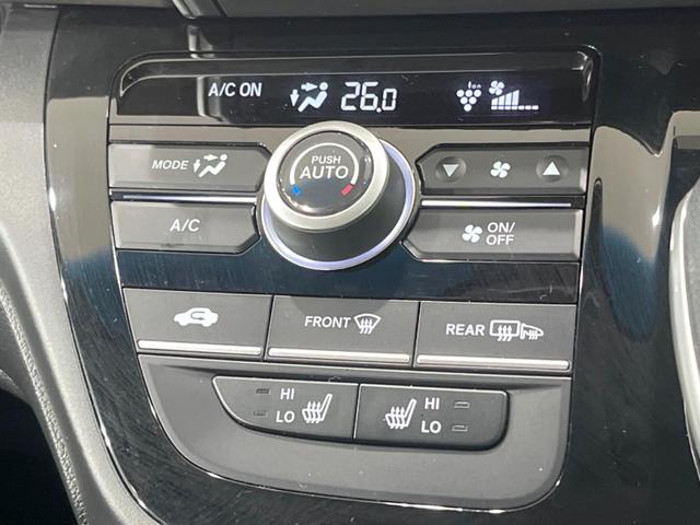 フリード+ハイブリッド ハイブリッドGブラックスタイル 両側電動スライド 純正8型ナビ バックカメラ 衝突被害軽減装置 レーダークルーズ 禁煙車 ドラレコ シートヒーター レーンアシスト LEDヘッド ETC 純正15インチアルミホイール オートライト(27枚目)