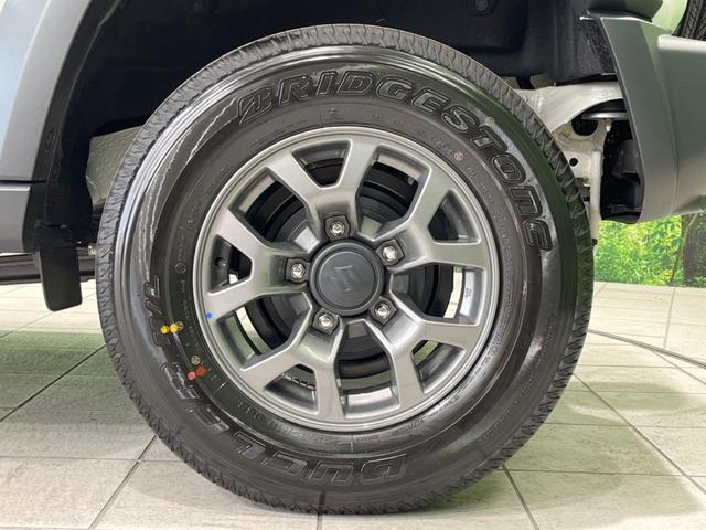 ジムニーノマド FC 禁煙車 9型SDナビ 衝突軽減装置 レーダークルーズ コーナーセンサー シートヒーター レーンアシスト 純正15インチアルミ バックカメラ LEDヘッドライト ドラレコ スマートキー(25枚目)