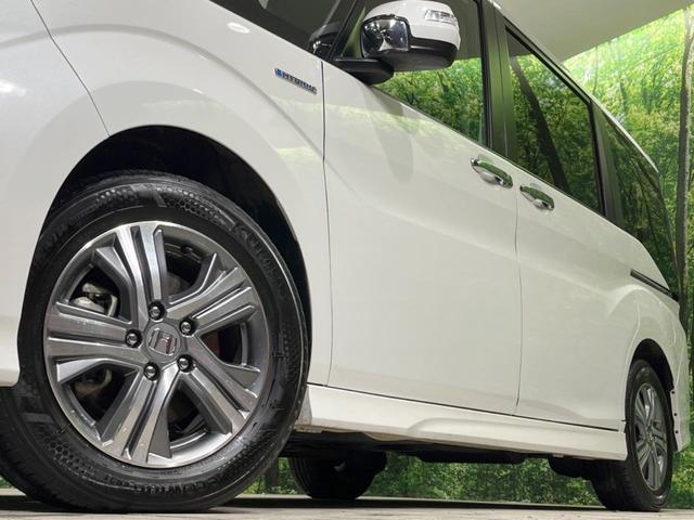 ステップワゴンスパーダ スパーダハイブリッド　Ｇ　ホンダセンシング　禁煙車　純正９型ナビ　両側電動ドア　後席モニター　衝突軽減装置　レーダークルーズ　バックカメラ　ＬＥＤヘッド＆フォグ　デュアルエアコン　純正１６インチアルミ　車線逸脱警報　ビルトインＥＴＣ（15枚目）