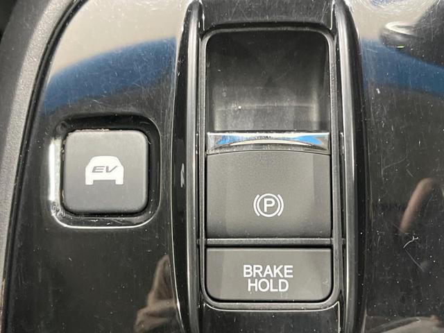 ステップワゴンスパーダ スパーダハイブリッド　Ｇ　ホンダセンシング　禁煙車　純正９型ナビ　両側電動ドア　後席モニター　衝突軽減装置　レーダークルーズ　バックカメラ　ＬＥＤヘッド＆フォグ　デュアルエアコン　純正１６インチアルミ　車線逸脱警報　ビルトインＥＴＣ（41枚目）