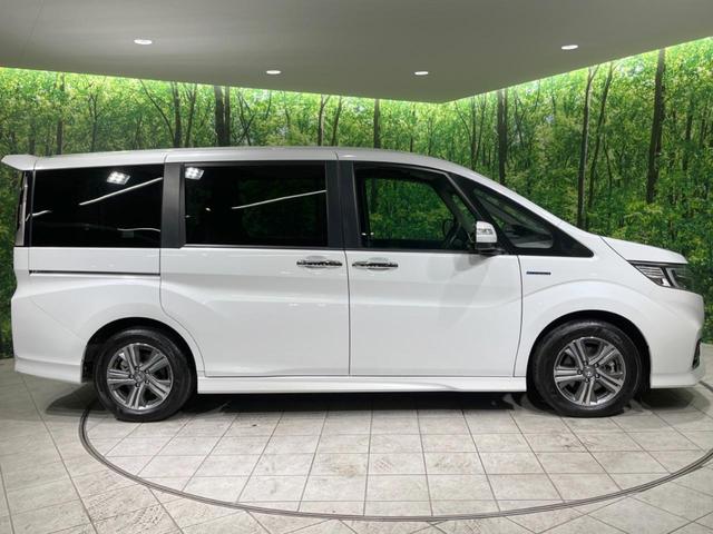 ステップワゴンスパーダ スパーダハイブリッド　Ｇ　ホンダセンシング　禁煙車　純正９型ナビ　両側電動ドア　後席モニター　衝突軽減装置　レーダークルーズ　バックカメラ　ＬＥＤヘッド＆フォグ　デュアルエアコン　純正１６インチアルミ　車線逸脱警報　ビルトインＥＴＣ（55枚目）