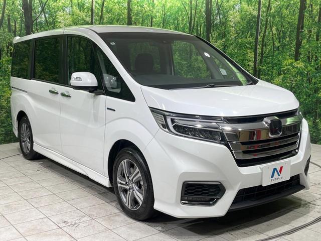 ステップワゴンスパーダ スパーダハイブリッド　Ｇ　ホンダセンシング　禁煙車　純正９型ナビ　両側電動ドア　後席モニター　衝突軽減装置　レーダークルーズ　バックカメラ　ＬＥＤヘッド＆フォグ　デュアルエアコン　純正１６インチアルミ　車線逸脱警報　ビルトインＥＴＣ（57枚目）