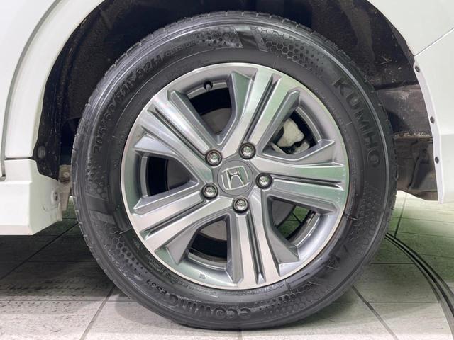 ステップワゴンスパーダ スパーダハイブリッド　Ｇ　ホンダセンシング　禁煙車　純正９型ナビ　両側電動ドア　後席モニター　衝突軽減装置　レーダークルーズ　バックカメラ　ＬＥＤヘッド＆フォグ　デュアルエアコン　純正１６インチアルミ　車線逸脱警報　ビルトインＥＴＣ（58枚目）