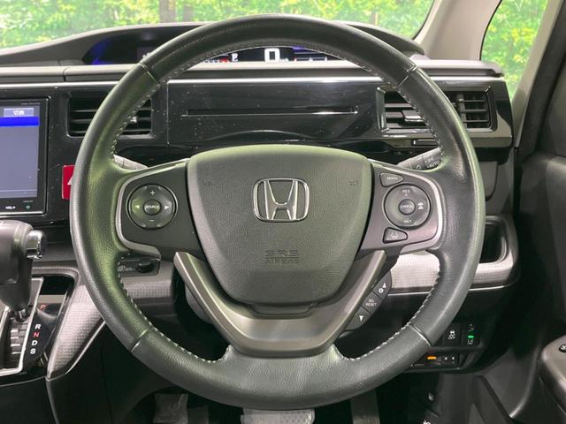 ステップワゴンスパーダ スパーダアドバンスパッケージβ　純正９型ナビ　両側電動ドア　後席モニター　衝突軽減装置　レーダークルーズ　禁煙車　スマートキー　ＬＥＤヘッド　ビルトインＥＴＣ　純正１６インチアルミ　車線逸脱警報　オートライト（14枚目）