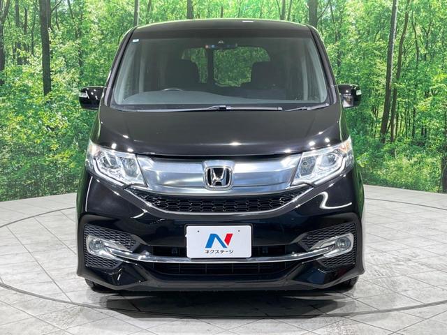 ステップワゴンスパーダ スパーダアドバンスパッケージβ　純正９型ナビ　両側電動ドア　後席モニター　衝突軽減装置　レーダークルーズ　禁煙車　スマートキー　ＬＥＤヘッド　ビルトインＥＴＣ　純正１６インチアルミ　車線逸脱警報　オートライト（18枚目）