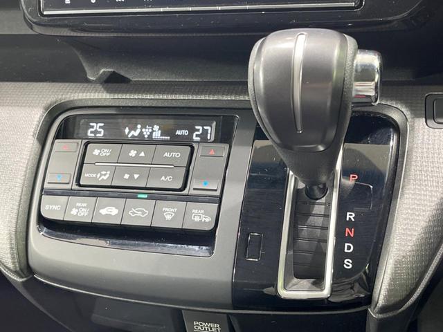 ステップワゴンスパーダ スパーダアドバンスパッケージβ　純正９型ナビ　両側電動ドア　後席モニター　衝突軽減装置　レーダークルーズ　禁煙車　スマートキー　ＬＥＤヘッド　ビルトインＥＴＣ　純正１６インチアルミ　車線逸脱警報　オートライト（30枚目）