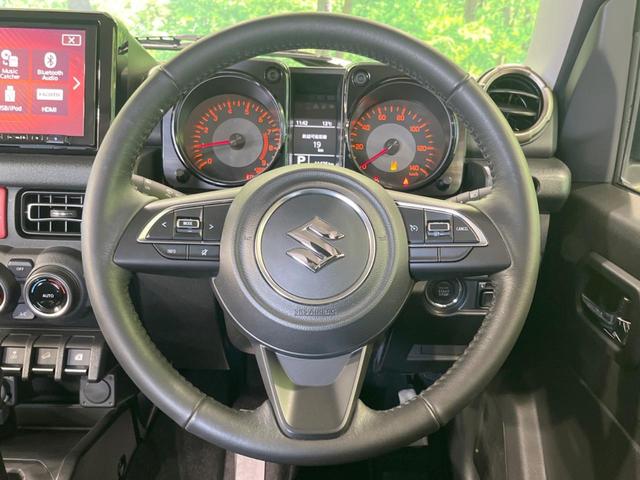 ジムニー ＸＣ　４ＷＤ　ターボ　禁煙車　純正９型ナビ　衝突軽減装置　バックカメラ　オートハイビーム＆ＬＥＤヘッド　前席シートヒーター　コーナーセンサー　スマートキー　オートライト　純正１６インチアルミ（11枚目）