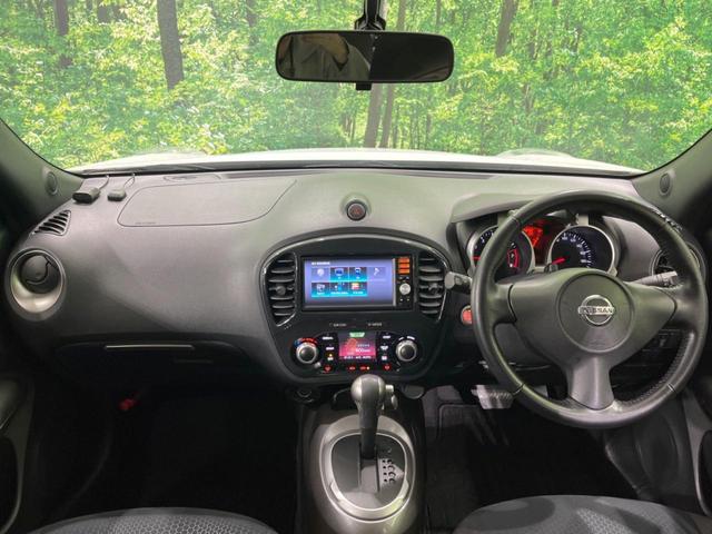 ジューク 15RX タイプV 禁煙車 純正ナビ バックカメラ HIDヘッドランプ ETC フルセグTV スマートキー 純正17インチアルミ オートライト オートエアコン 電動格納ミラー ドアバイザー CD再生(2枚目)