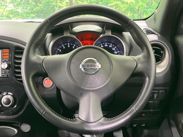 ジューク 15RX タイプV 禁煙車 純正ナビ バックカメラ HIDヘッドランプ ETC フルセグTV スマートキー 純正17インチアルミ オートライト オートエアコン 電動格納ミラー ドアバイザー CD再生(11枚目)