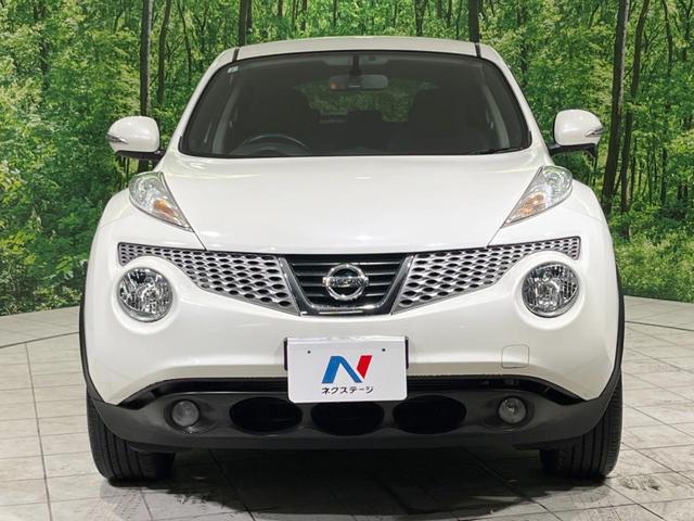 ジューク 15RX タイプV 禁煙車 純正ナビ バックカメラ HIDヘッドランプ ETC フルセグTV スマートキー 純正17インチアルミ オートライト オートエアコン 電動格納ミラー ドアバイザー CD再生(14枚目)