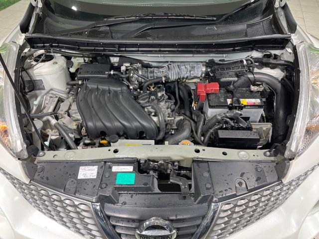 ジューク 15RX タイプV 禁煙車 純正ナビ バックカメラ HIDヘッドランプ ETC フルセグTV スマートキー 純正17インチアルミ オートライト オートエアコン 電動格納ミラー ドアバイザー CD再生(18枚目)