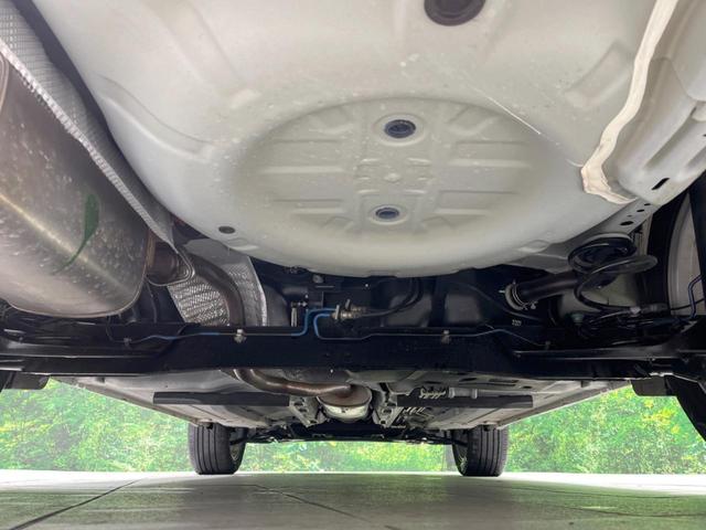 ジューク 15RX タイプV 禁煙車 純正ナビ バックカメラ HIDヘッドランプ ETC フルセグTV スマートキー 純正17インチアルミ オートライト オートエアコン 電動格納ミラー ドアバイザー CD再生(19枚目)