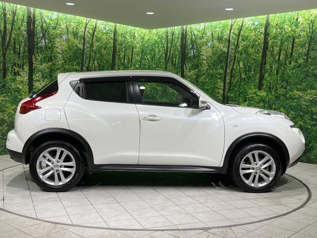 ジューク 15RX タイプV 禁煙車 純正ナビ バックカメラ HIDヘッドランプ ETC フルセグTV スマートキー 純正17インチアルミ オートライト オートエアコン 電動格納ミラー ドアバイザー CD再生(27枚目)