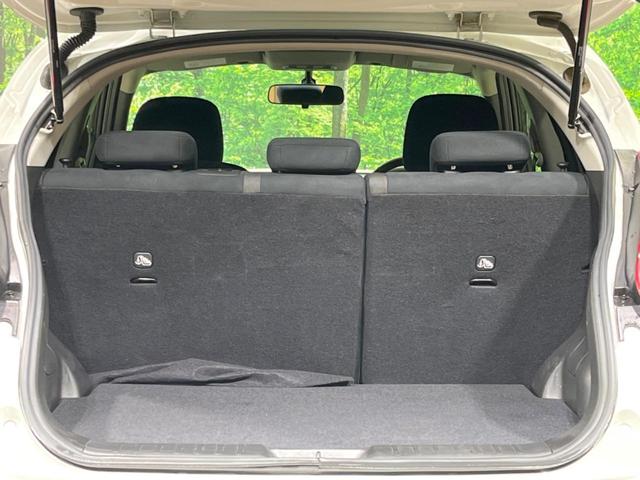 ジューク 15RX タイプV 禁煙車 純正ナビ バックカメラ HIDヘッドランプ ETC フルセグTV スマートキー 純正17インチアルミ オートライト オートエアコン 電動格納ミラー ドアバイザー CD再生(34枚目)