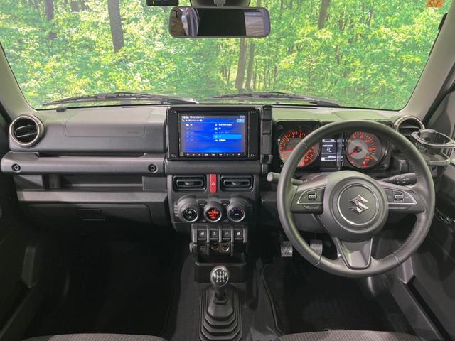 ジムニー XC 禁煙車 MT車 純正8型ナビ 衝突軽減装置 クルコン 前席シートヒーター オートハイビーム&LEDヘッド バックカメラ 純正16インチアルミ ドラレコ スマートキー ETC 純正革巻きハンドル(2枚目)