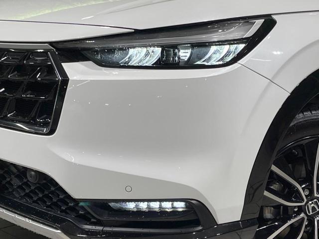 ヴェゼル ｅ：ＨＥＶ　Ｚ　禁煙車　純正９型ナビ　全周囲カメラ　衝突軽減装置　レーダークルーズ　電動リアゲート　シートヒーター　ブラインドスポットモニター　ハーフレザーシート　ＬＥＤヘッド　純正１８インチアルミ　ＥＴＣ２．０（13枚目）