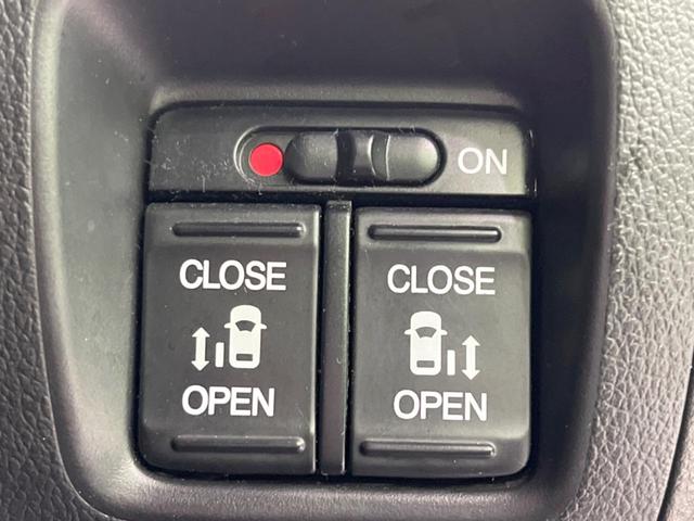 Ｎ－ＢＯＸカスタム Ｇ　ターボＳＳパッケージ　禁煙車　純正ナビ　衝突軽減装置　両側電動ドア　クルコン　バックカメラ　オートエアコン　オートライト＆ＨＩＤヘッド　パドルシフト　純正１５インチアルミ　スマートキー　ＥＴＣ（5枚目）