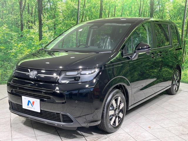 フリード エアー　ＥＸ　禁煙車　ディスプレイオーディオ　両側電動ドア　衝突軽減装置　レーダークルーズ　シートヒーター　レーンアシスト　純正１５インチアルミ　リアサーキュレーター　スマートキー（25枚目）