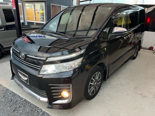 ヴォクシー ZS 煌 地上デジタル 両側パワードア アイドリングストップ車 パワーウィンド 横滑防止 ブルートゥースオーディオ Aライト 衝突安全ボディ 整備記録簿 DVD可 フルフラットシート 電格ミラー 盗難防止装置(30枚目)